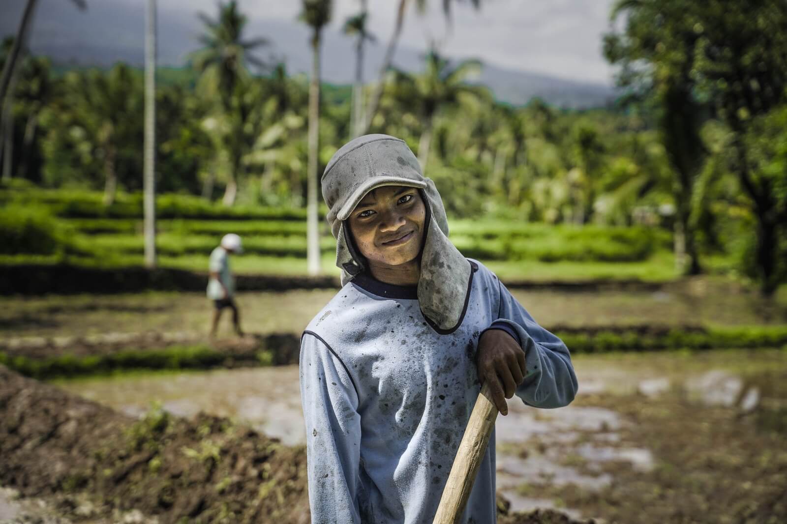 Local farmer with traditional tools
